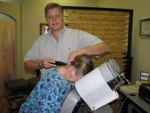 Dr. Laurich treats a patient using the Pro-Adjuster.