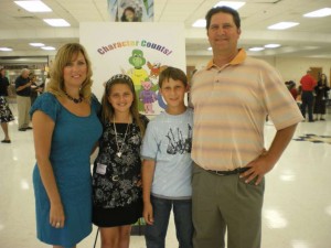 Hayleigh is pictured here with her mom and New Horizons teacher, Deb; her brother and New Horizons student, Andrew; and her Dad Robert.   
