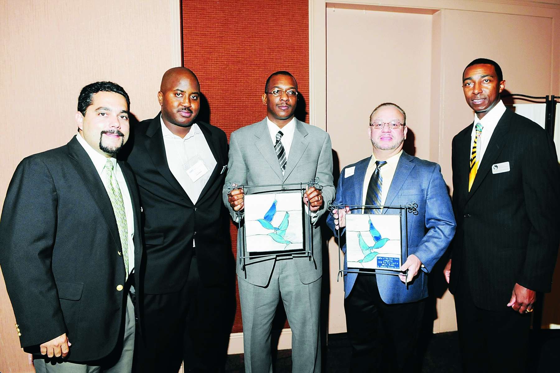 Layonel Lopez, Paul A. Nunnally, Derrick D. Berry, Israel Pabon, Bishop Oshea Granger, taking part in the Blue Dove Awards ceremony, presented by Hospice of Palm Beach County.