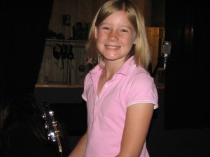 Emily Webster, 10-year-old rock star at Boomer's Music. Check out her video on this page!