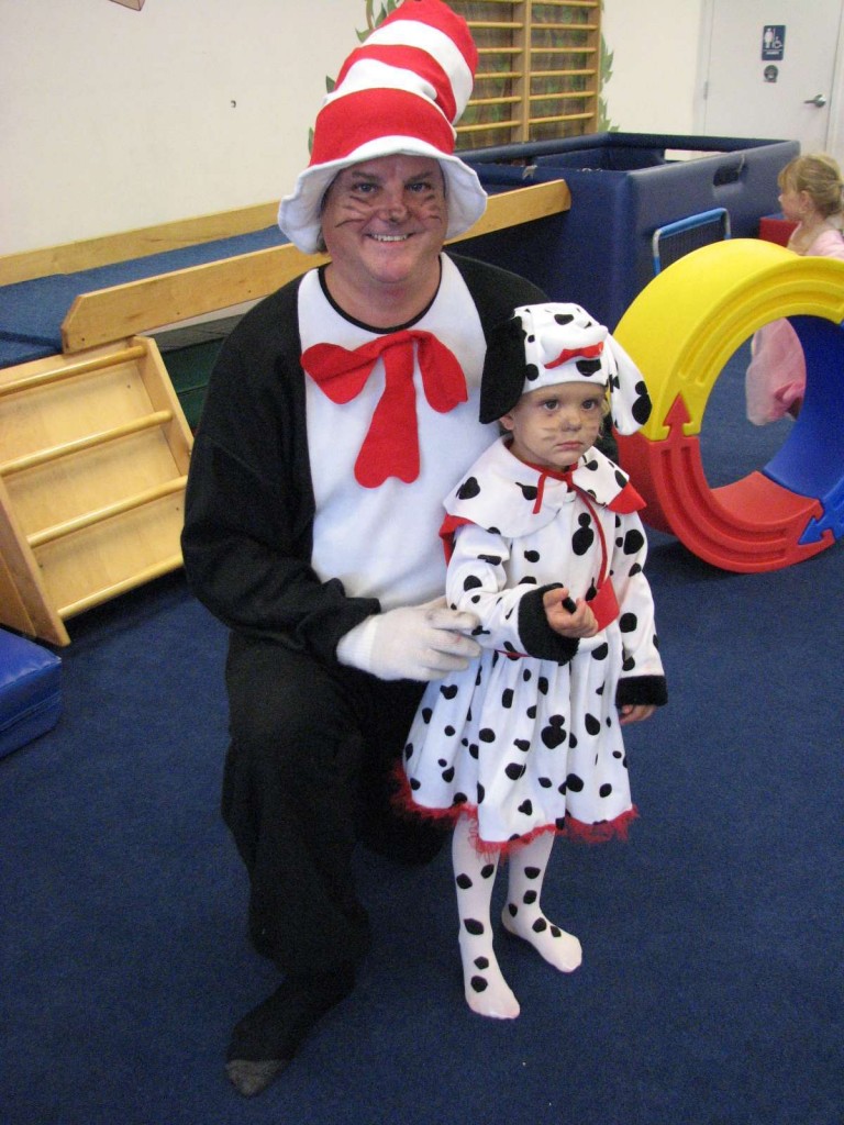 The Cat in the Hat (Gre) and his young daughter (Bryce) as a dalmation at My Gym's Halloween Bash