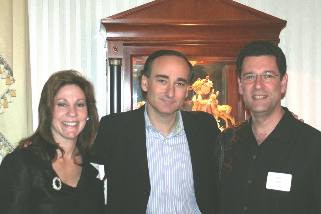 Author Chris Bohjalian, flanked by hosts Ron and Tammy Smith of Wellington. Photos by Lenny Sukienik. 