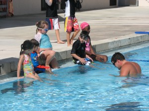 A small group lesson at Santa Luces swimming pool with instructor "Mr. Shane"