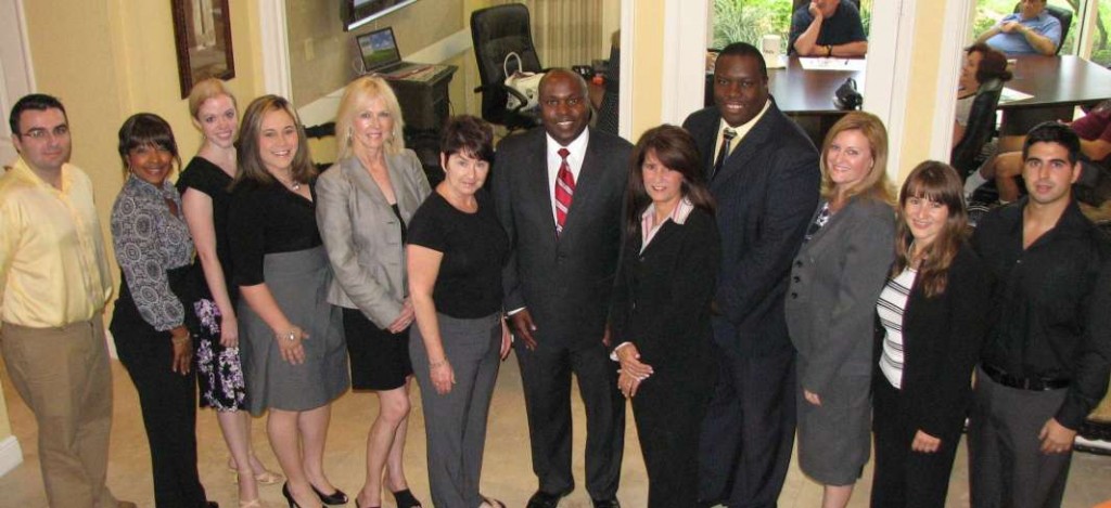The staff of the Law Office of Malcolm E. Harrison