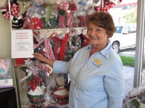 Josie Kern shows off the Holiday Gift Basket specials