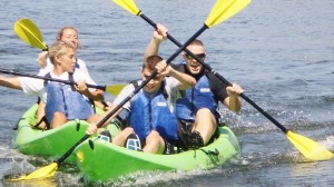 Kayak races at the RP Music & Art Fest on Lake Challenger.