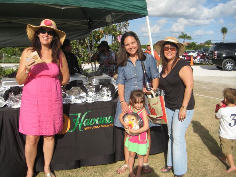 Leadership PBC at Friends and Family Polo Day. Lee Williams with winner of the WholeFoods/Chick-Fil-A raffle Michelle McGovern, her daughter Victoria and Silvia C Garcia.