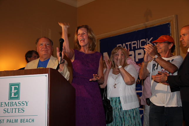 The Palm Beach County Democratic Party had its early primary results, unity party and fall campaign kickoff at the Embassy Suites (formerly the Royal Crowne Plaza Hotel), located on Belvedere Road, in West Palm Beach, Florida on Tuesday night, August 14. Pictured here is a smiling and happy Anne Gannon, who won her primary in the race for Tax Collector. Other candidates were in attendance that evening as well.  Photo by Carol Porter.