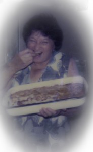Fading photo: Grandma Rae and her apple pie. Circa: Late 1970’s. 