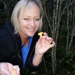 Terri Marshall - mushroom picking in Norway. Photo by Lisbeth Fallon. See "Travel with Terri" this month.