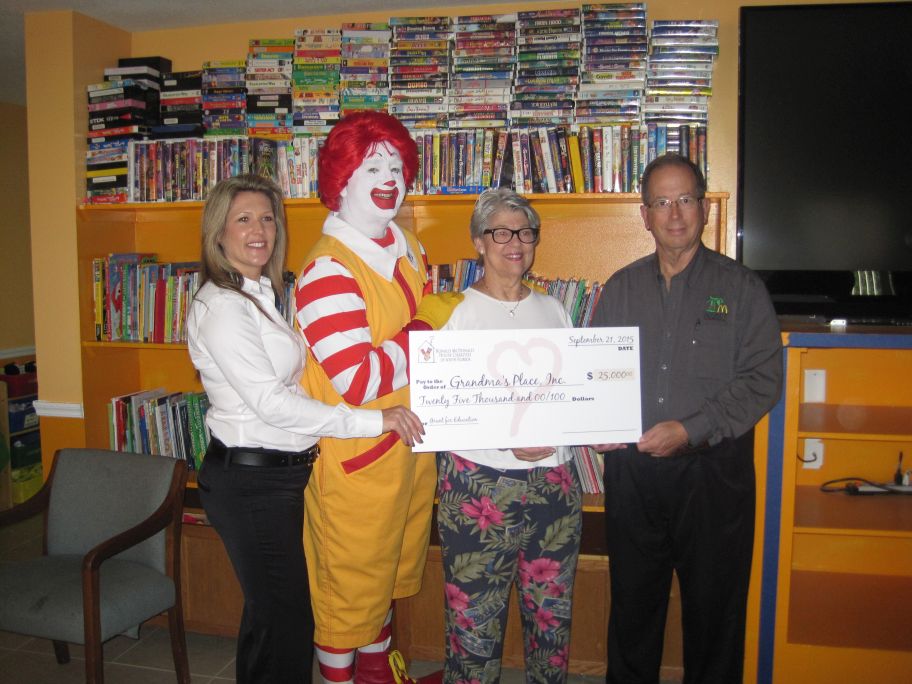 September, 2015 – Ronald McDonald Presents Grandma’s Place with Check