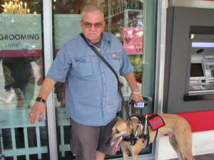 Veteran Frank with his service dog Buff, thanks to the Hounds & Heroes program. Photo by Krista Martinelli.