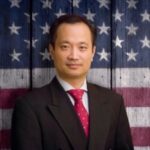 Homepage-Dr Ming Wang with American flag as background