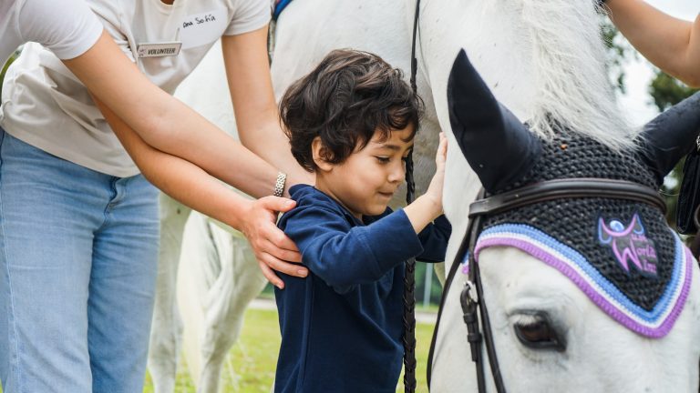 JustWorld Brings The Joy Of Horses 🐎 To Pioneer Park 📚 Elementary